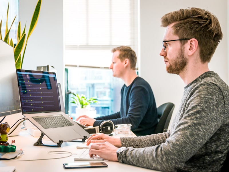 Team collaborating on technology solutions in a modern workspace